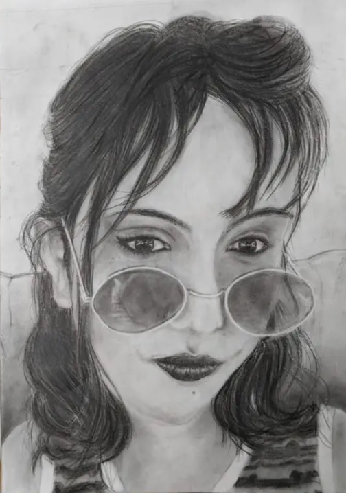 Stylish charcoal portrait of young woman wearing round sunglasses with confident expression, realistic drawing showcasing contemporary fashion and attitude