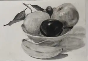 Detailed charcoal drawing of mixed fruit in ceramic bowl, realistic still life artwork showcasing light and shadow techniques